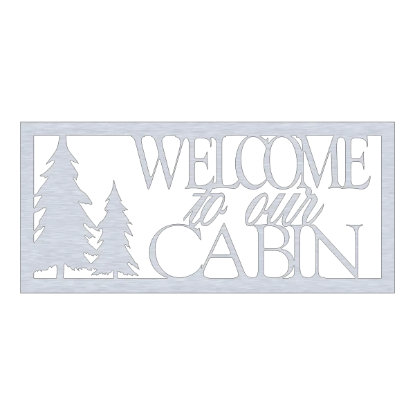 A rectangular wall sign made of aluminum with a brushed finish, featuring the words 'Welcome to Our Cabin' in a mix of script and block letters. To the left, two stylized pine trees are cut out, creating a silhouette effect. The sign has a modern, rustic look and is set against a black background.